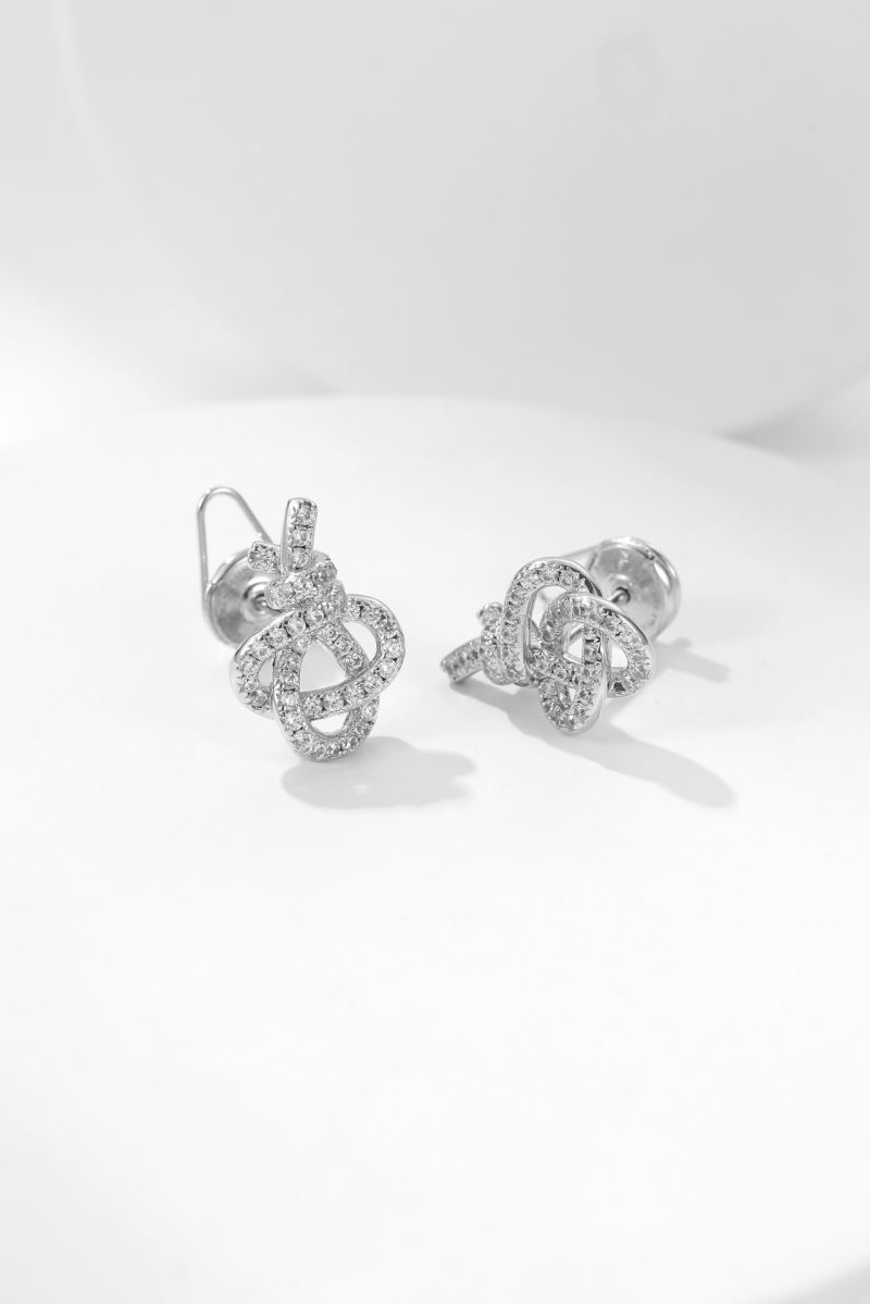 T*f*ny earrings
